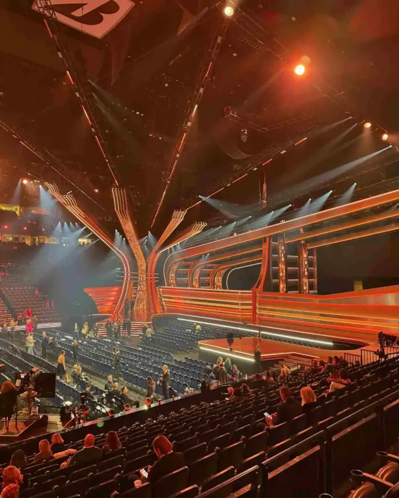 An illuminated stage inside the arena where CMA Fest offers Free Summer Activities To Do in Nashville