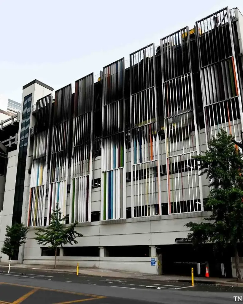 The multi-colored vertical slat facade of the downtown Nashville public library parking garage