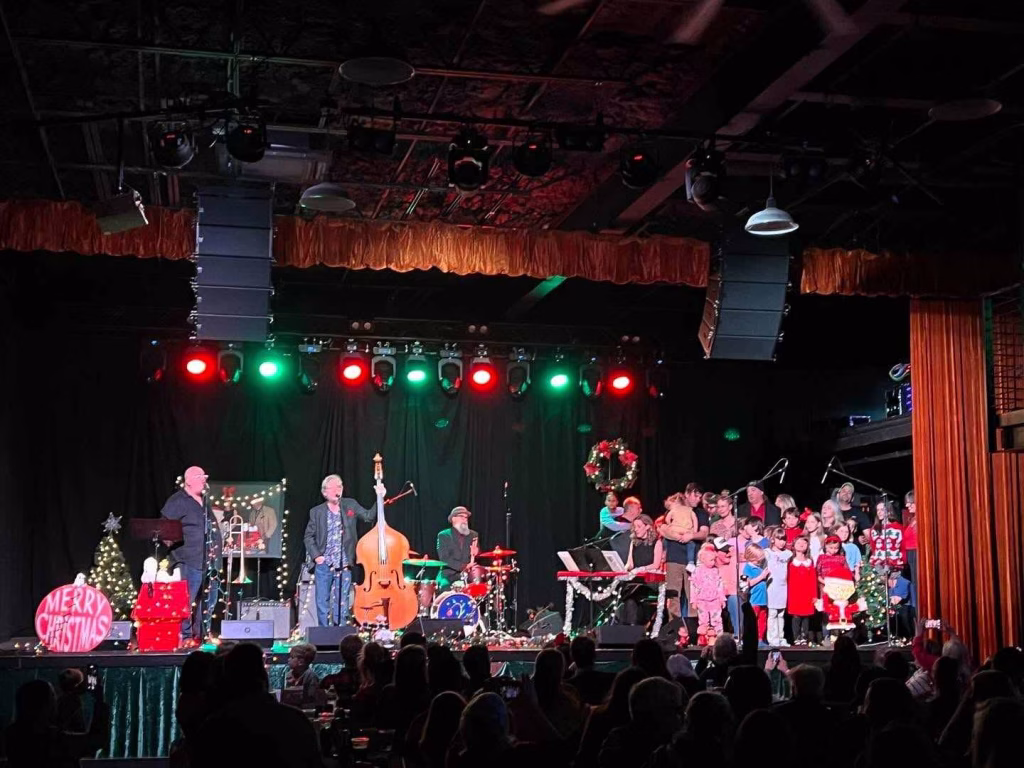 Christmas concert celebration at Eastside Bowl, Nashville in February, featuring band and children’s choir.