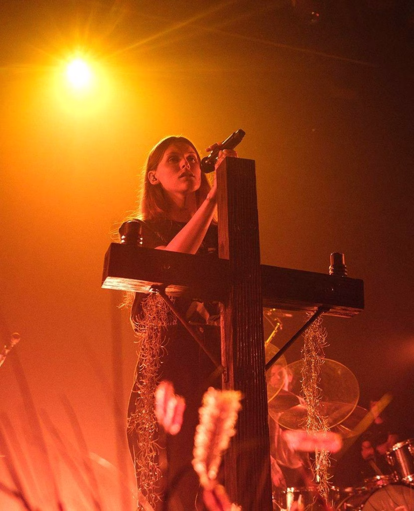 Country artist performing live at Grand Ole Opry during Nashville in May.