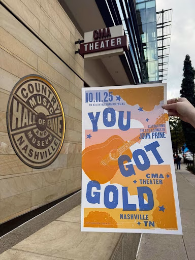 A “You Got Gold” John Prine concert poster near the Country Music Hall of Fame—Nashville in November.  