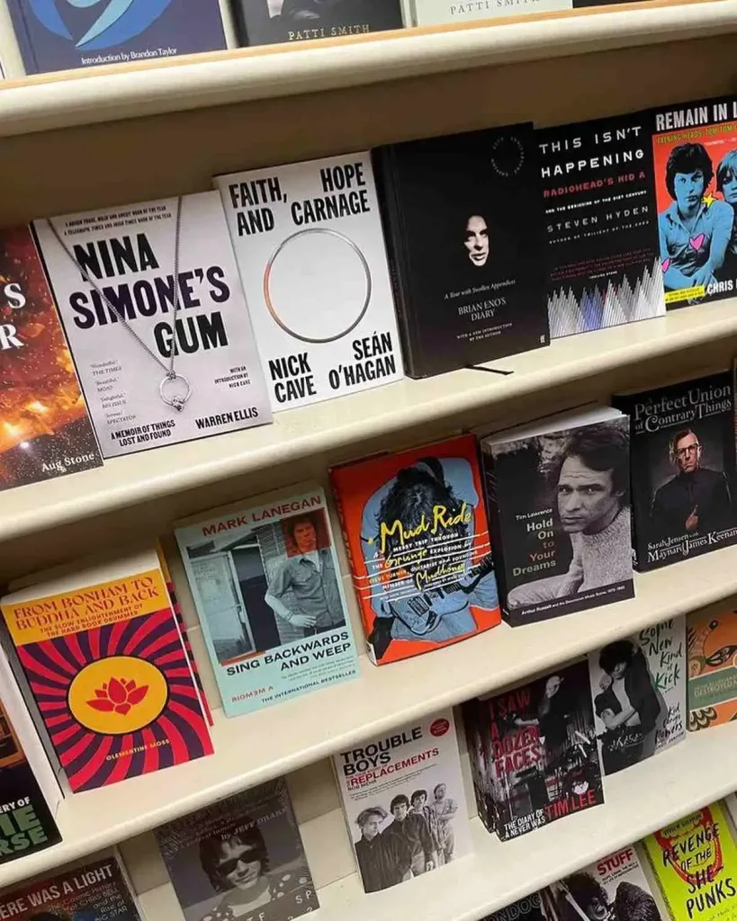 Grimeys Nashville: Vinyl, Records & Music City Treasures Bookshelves display biographies of artists like Nina Simone and Radiohead at Grimey's Nashville