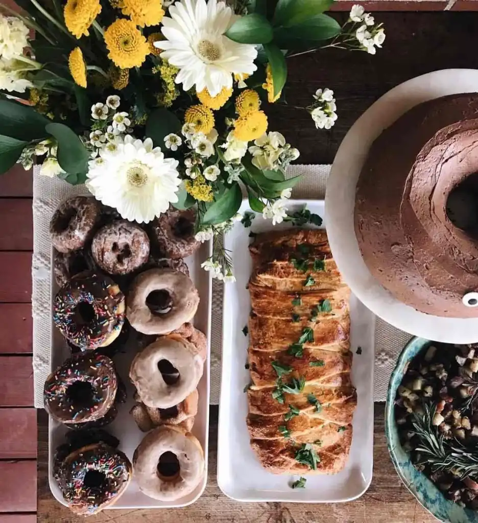 A beautiful spread of assorted donuts, pastry, and cake from the Fox's Donut Den Nashville menu