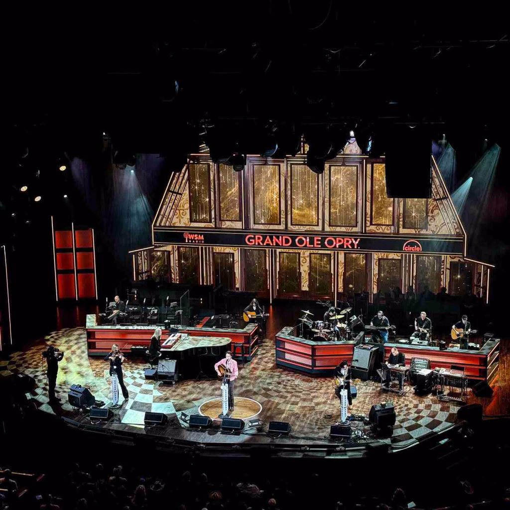 Live country music performance at the Grand Ole Opry, a must-see in Nashville in March.