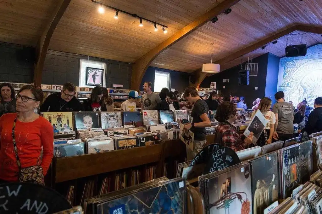 Grimeys Nashville: Vinyl, Records & Music City Treasures Customers browse the extensive record bins inside the iconic music shop, Grimey's Nashville.