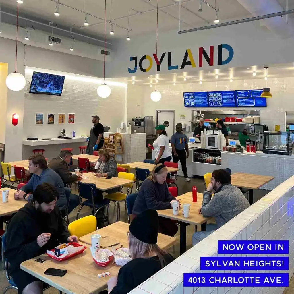 The bright, modern dining room and counter area of Joyland Nashville in Sylvan Heights