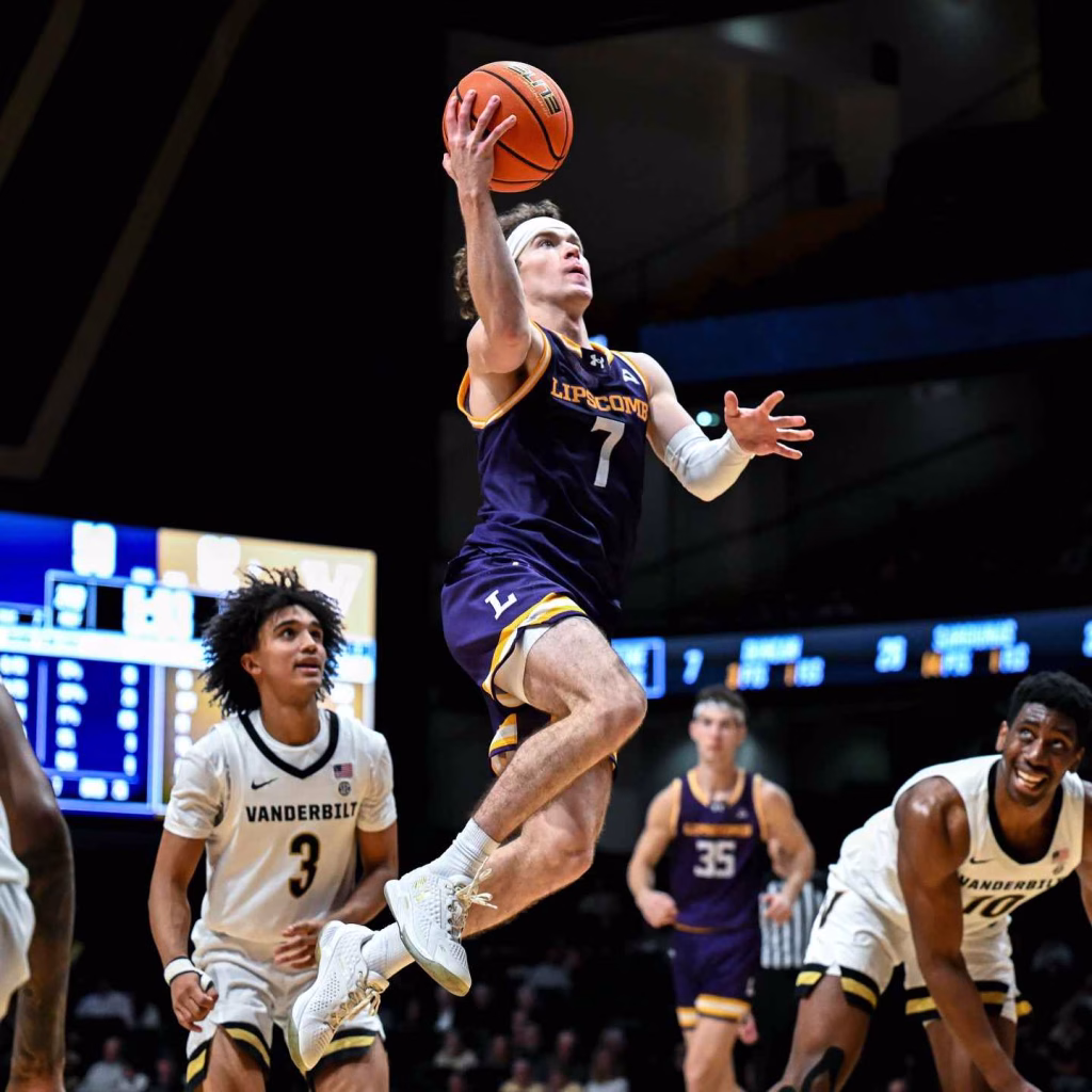 Lipscomb player leaps for a layup during a thrilling college basketball matchup in Nashville in January.