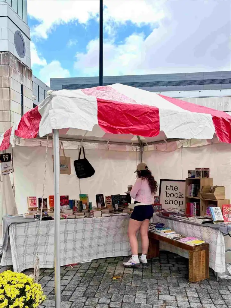 A white rug with the store's name woven into it sits inside The Bookshop Nashville