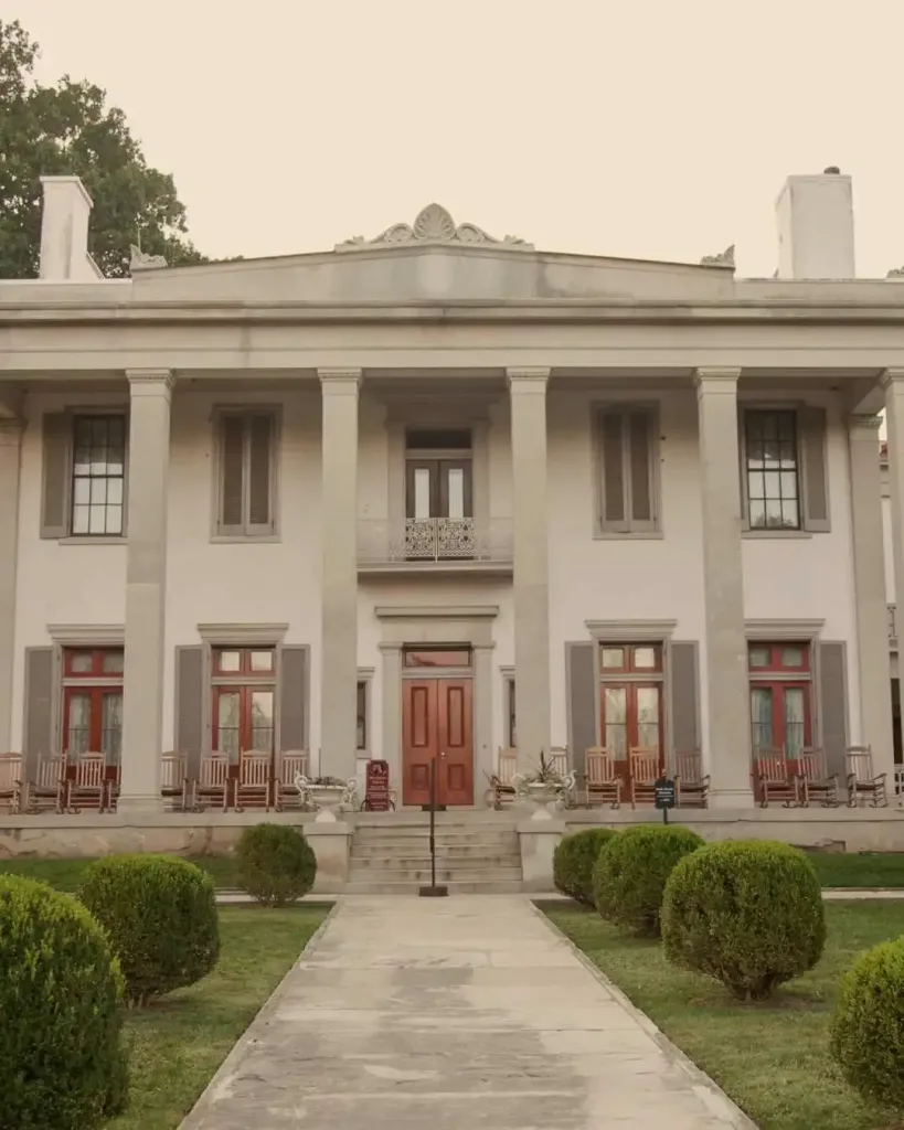 The grand, columned entrance of Belle Meade Plantation, a quintessential stop for unique things you can only do in Nashville. 