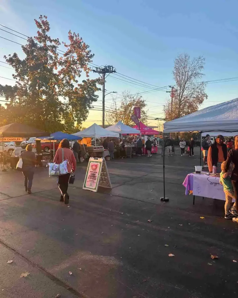 East Nashville Summer Bucket List Guide A bustling outdoor market at sunset, a popular and engaging item for the East Nashville Summer Bucket List